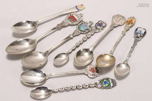 Nine Assorted Silver Souvenir Spoons,