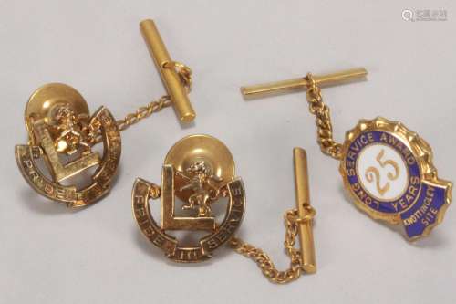 Three Gilt Silver Service Badges,