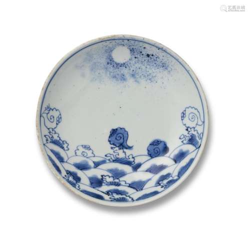 A CHINESE BLUE AND WHITE PORCELAIN CIRCULAR ‘SHELL AND WAVE’...