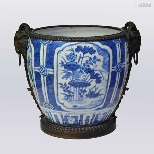 A LARGE CHINESE BLUE AND WHITE PORCELAIN GILT-BRONZE MOUNTED...