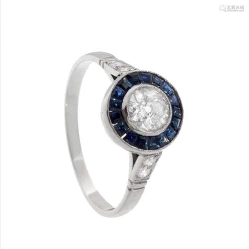 Ring in 18k white gold with diamonds and sapphires. Partridg...