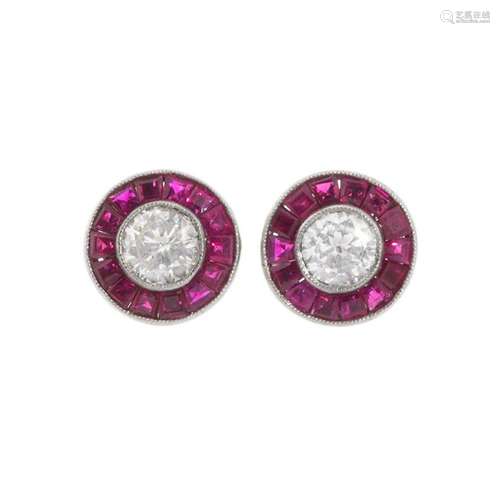 Pair of earrings in 18k white gold, diamonds and rubies. Par...