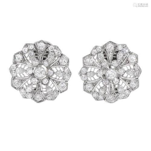 Pair of earrings in 18k white gold. and diamonds. Rosette mo...