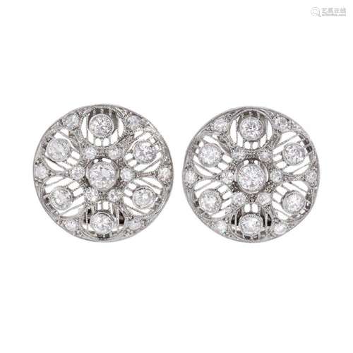 Pair of earrings in 18k white gold. Rosette model with brill...