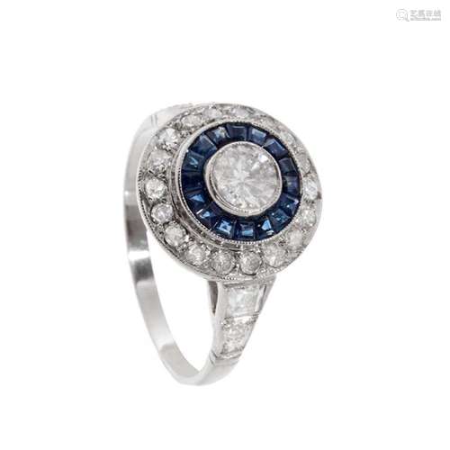 Ring in 18kt white gold, sapphires and diamonds. Partridge`s...