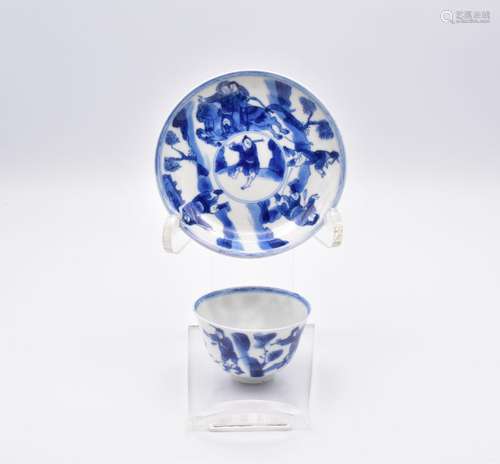 A CHINESE BLUE AND WHITE PORCELAIN TEA BOWL AND SAUCER, QING...