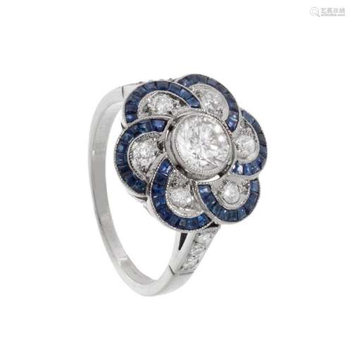 Ring in platinum, diamonds and sapphires. Rosette model, flo...