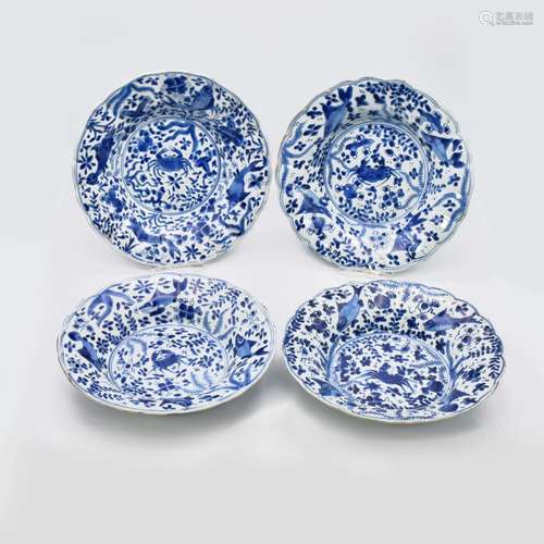 A SET OF FOUR CHINESE EXPORT BLUE AND WHITE PORCELAIN PLATES...