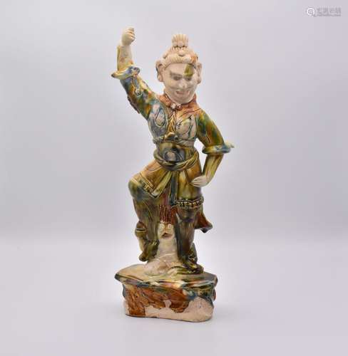 A RARE SMALL CHINESE BLUE AND SANCAI GLAZED FIGURE OF A LOKO...