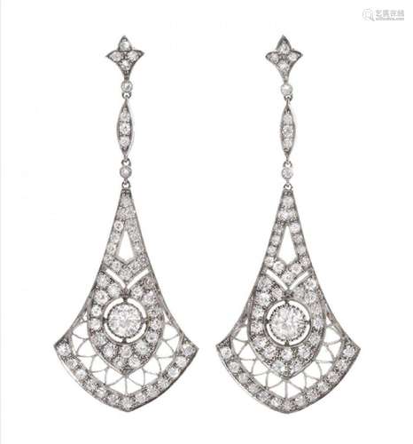 Pair of long movement earrings in platinum and diamonds. Mod...