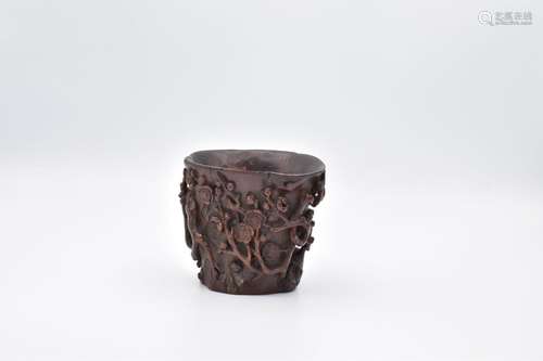 Ω A CHINESE BAMBOO PRUNUS LIBATION CUP, 17TH CENTURY