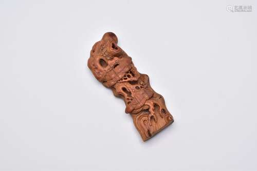 Ω A SMALL BAMBOO GNARLED PINE TREE WRIST WREST, QING DYNASTY...