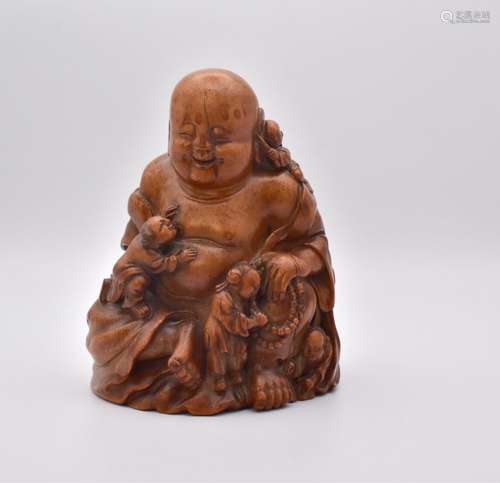 A CHINESE BAMBOO CARVING OF A SEATED BUDDHA, QING DYNASTY, 1...