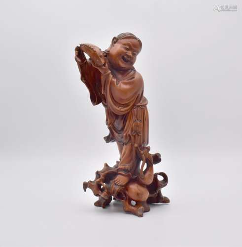 A CHINESE BOXWOOD CARVING OF LIU HAI, QING DYNASTY, 19TH CEN...