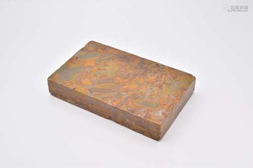 A CHINESE PUDDING STONE INKSTONE, QING DYNASTY, 18TH CENTURY