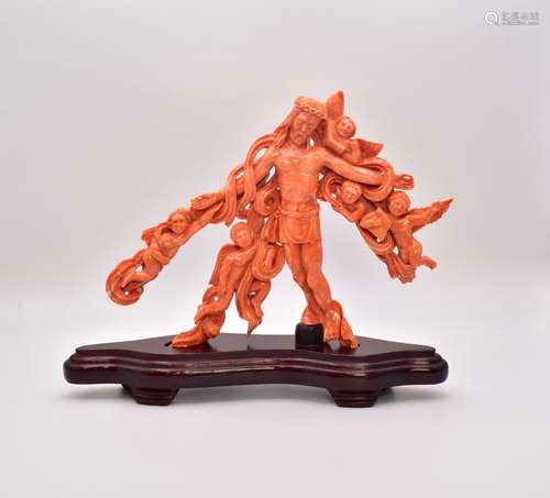 λ A SINO-PHILIPPINE CARVED CORAL ‘CRUCIFIXION’ GROUP, 18TH/1...