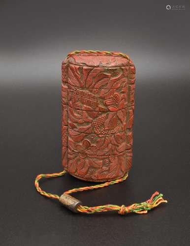 A JAPANESE CARVED RED LACQUER FIVE-TIER INRO, MEIJI PERIOD, ...