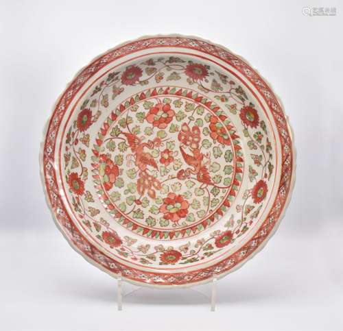 A CHINESE PORCELAIN IRON-RED ‘PEACOCK` DISH, LATE MING DYNAS...