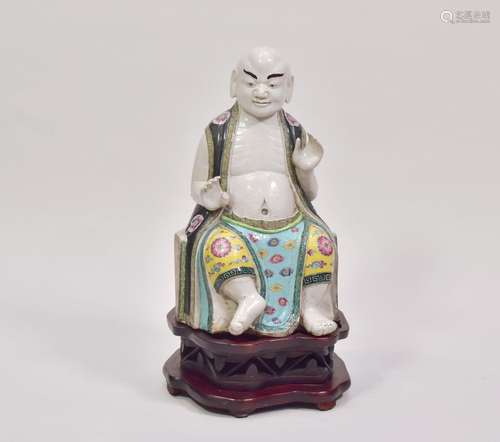 A LARGE CHINESE ‘FAMILLE-ROSE’ PORCELAIN FIGURE OF A LOHAN, ...