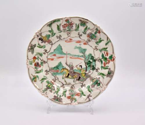 A CHINESE ‘FAMILLE-VERTE’ PORCELAIN ‘HUNTING SCENE’ LOBED DI...