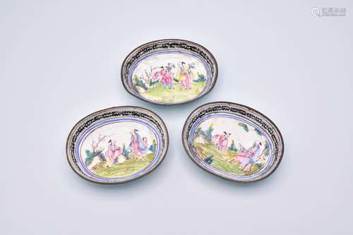 A SET OF THREE CANTON ENAMEL SAUCERS, QING DYNASTY, QIANLONG...