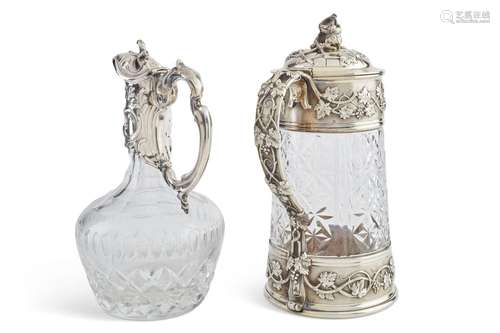 DEUX CARAFES EN ARGENT, VERMEIL ET VERRE TAILLEUNE PAR ODIOT...