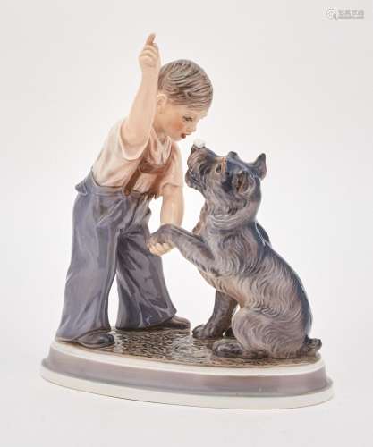 Danish Porcelain Figural Group of a Boy and a Dog