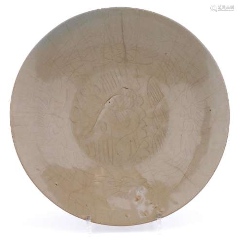 a Swatow dish with incised jumping carp design