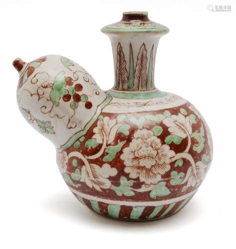 A wucai kendi with flowering peony and grape pattern