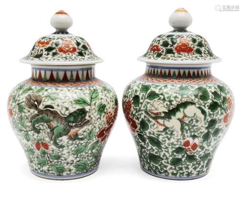 Two Chinese wucai foo-dog jars