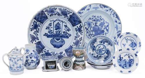 A group of mostly blue and white decorated ceramics