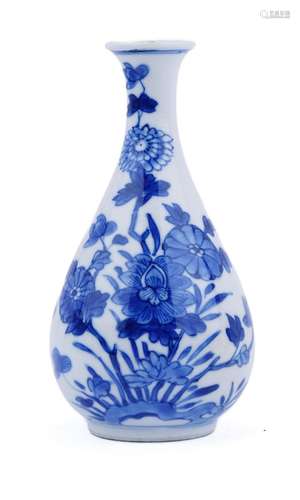 A small blue and white vase