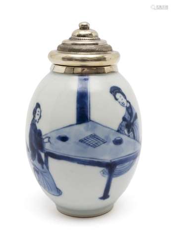 A blue and white canister with Dutch silver lid