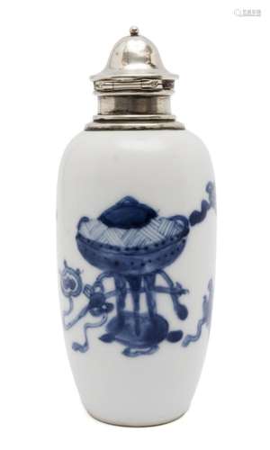 A small blue and white jar/bottle with Dutch silver lid