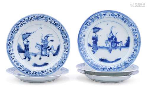 Five blue and white saucers