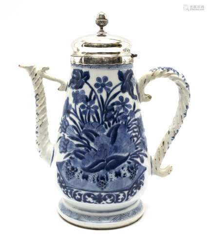 A large blue and white pot with Dutch silver lid