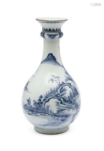 A blue and white bottle vase