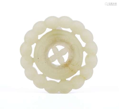 A round jade plaque amulet