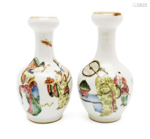 A small pair of famille rose vases with figures