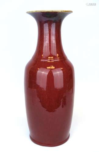 A large 'Ox blood' monochrome red glaze vase