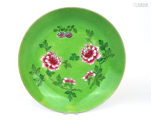 A green ground famille rose floral dish