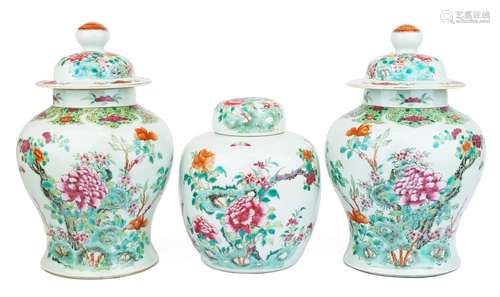 Two covered famille rose vases and a ginger jar