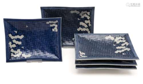 Five porcelain rectangular basket-weave dishes