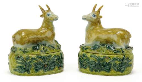 A pair of Delft polychrome pottery butter dishes