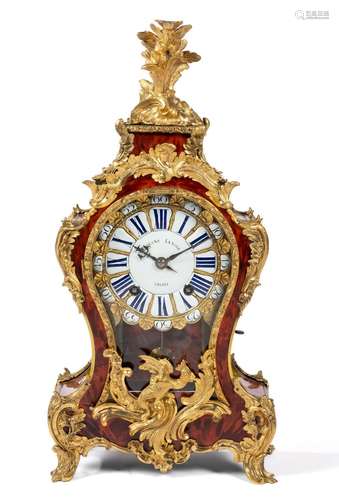 A Louis XV ormolu and tortoiseshell mantel clock