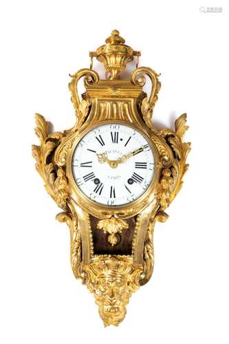 A Louis XVI ormolu cartel clock