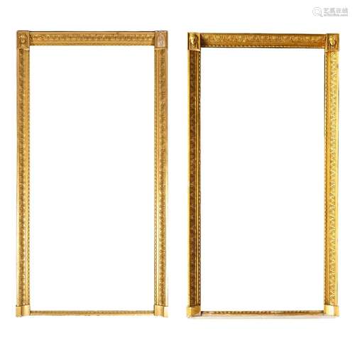 A large pair of Empire giltwood overmantel mirrors