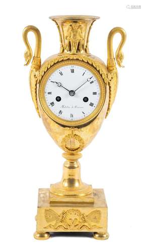 An Empire ormolu vase mantel clock