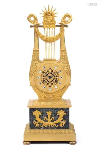 A Restauration ormolu and marble lyre mantel clock