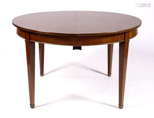 A Dutch brass-mounted mahogany extending dining table